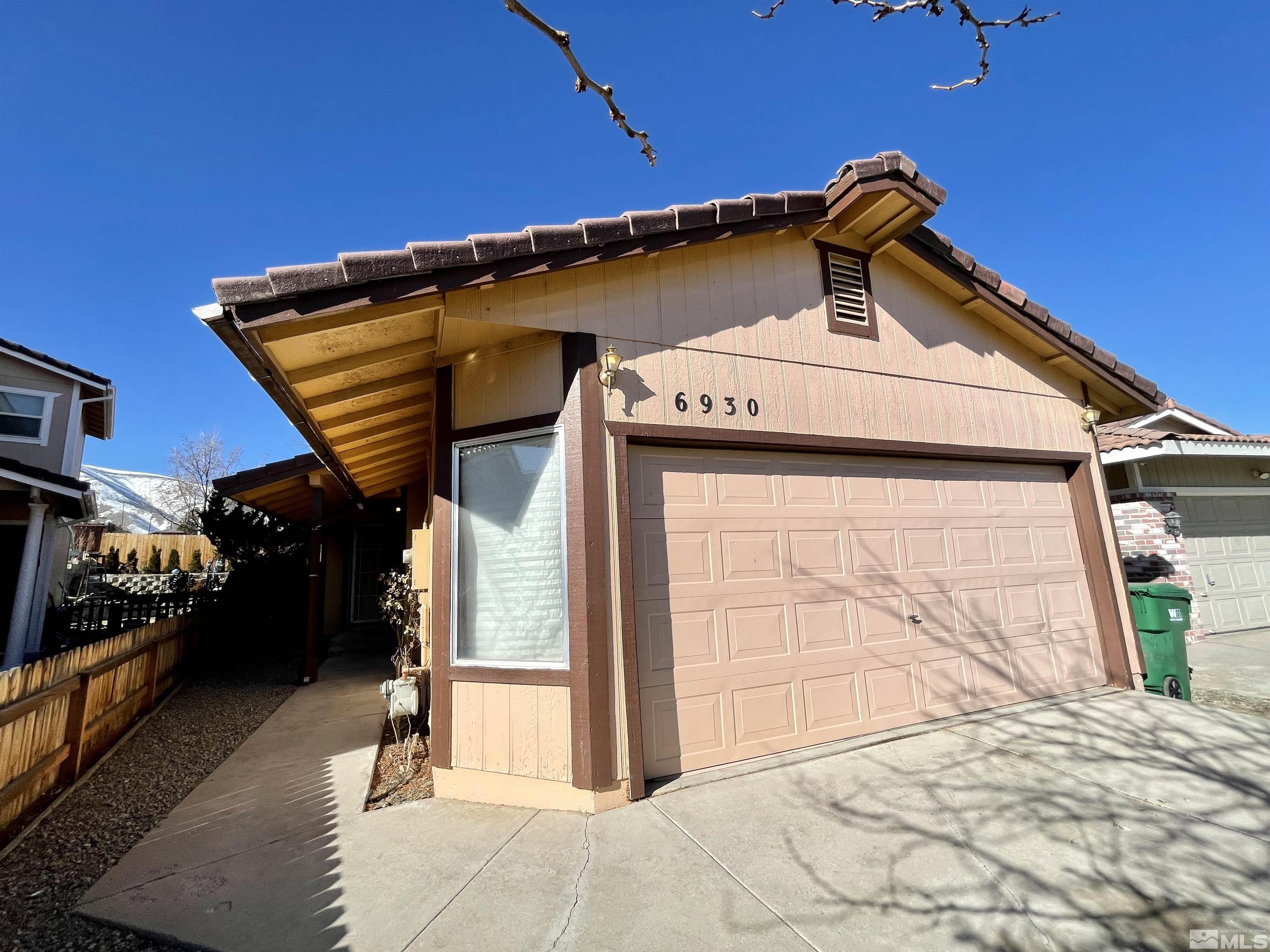6930 Flower Street Reno, NV 89506 - Photo 2 of 19 a view of a garage