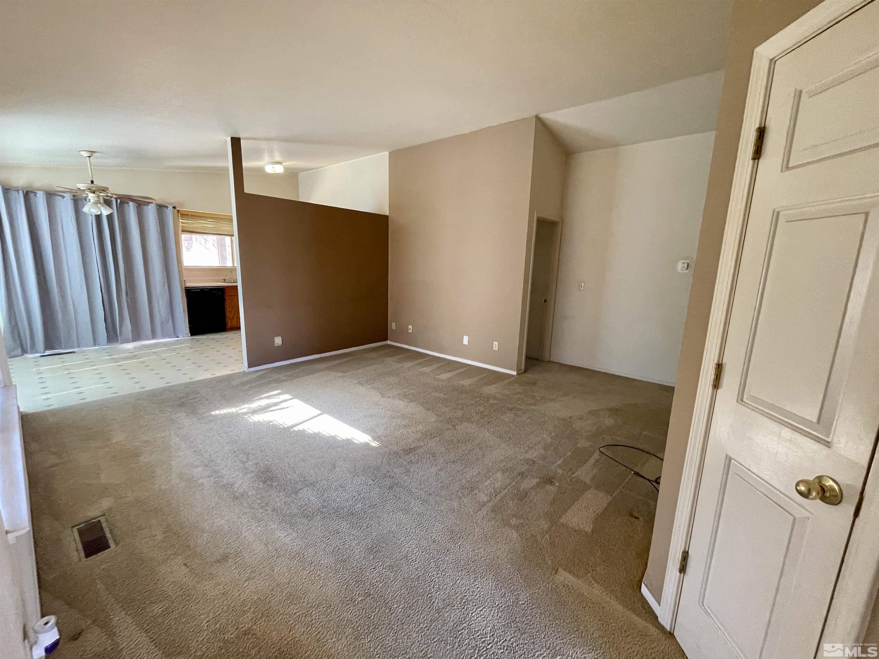 6930 Flower Street Reno, NV 89506 - Photo 3 of 19 a view of entryway with stairs