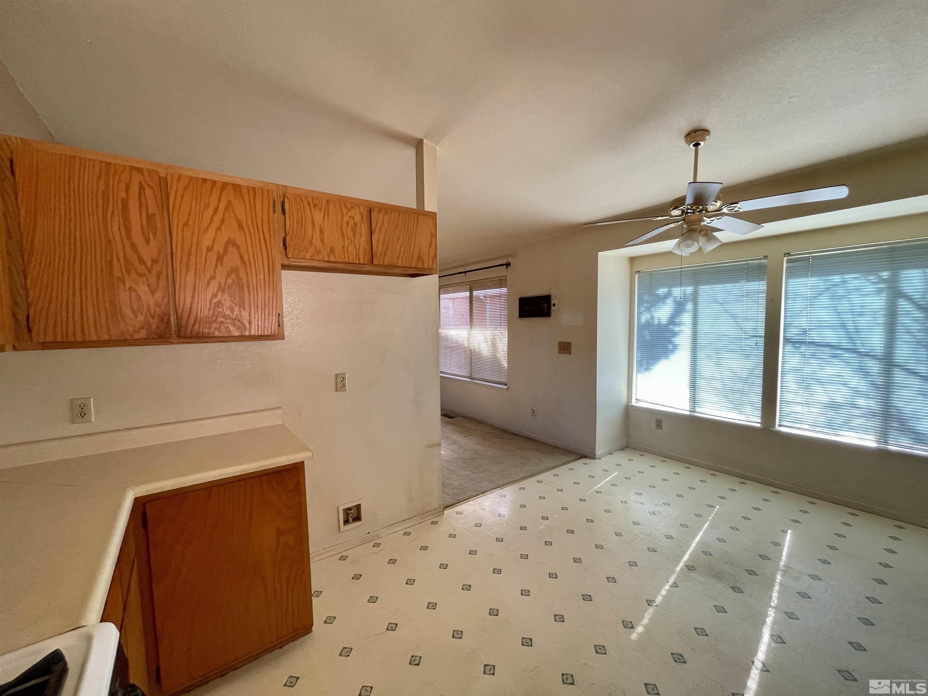 6930 Flower Street Reno, NV 89506 - Photo 6 of 19 a bedroom with furniture and window
