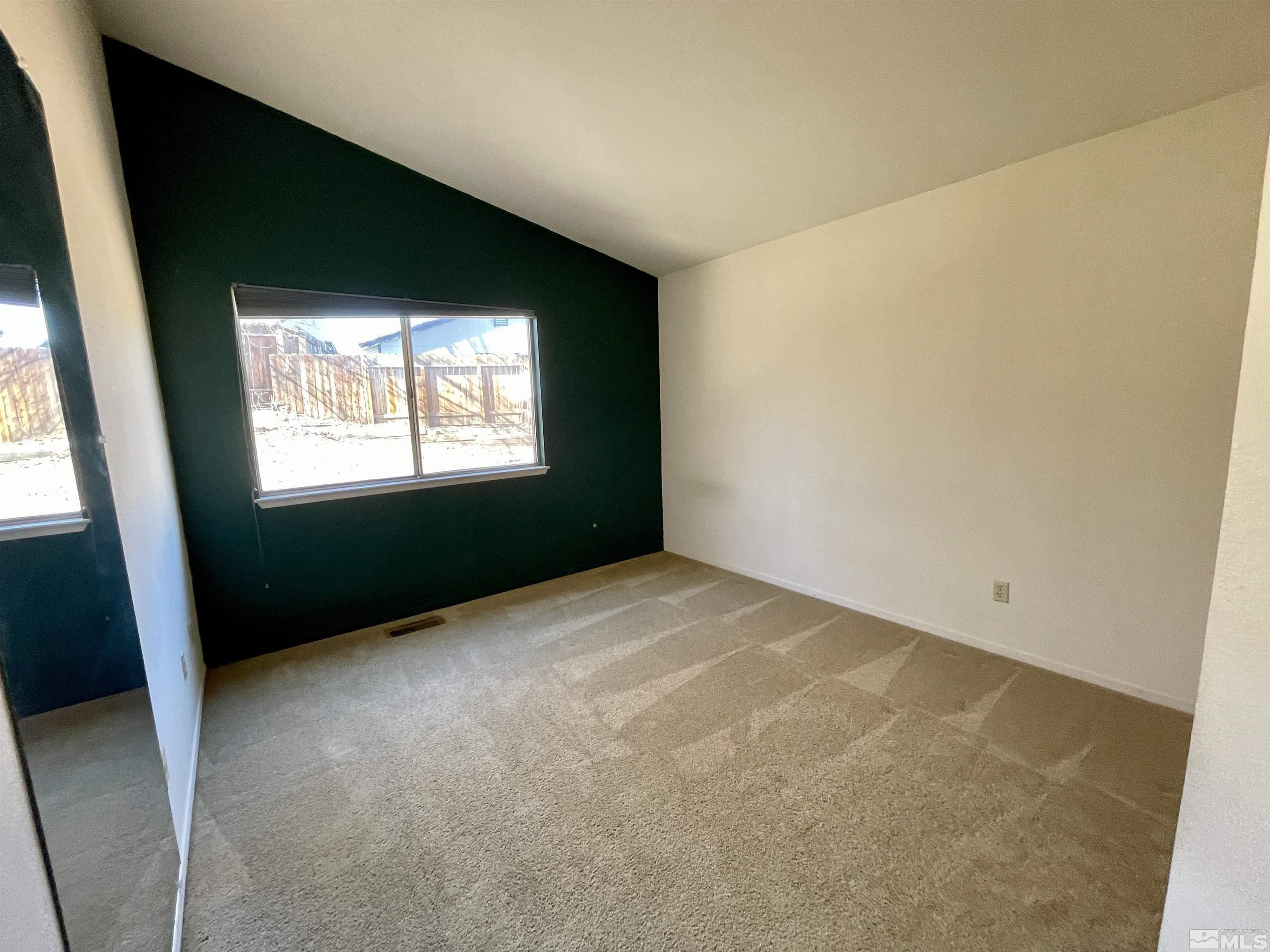 6930 Flower Street Reno, NV 89506 - Photo 8 of 19 an empty room with a window