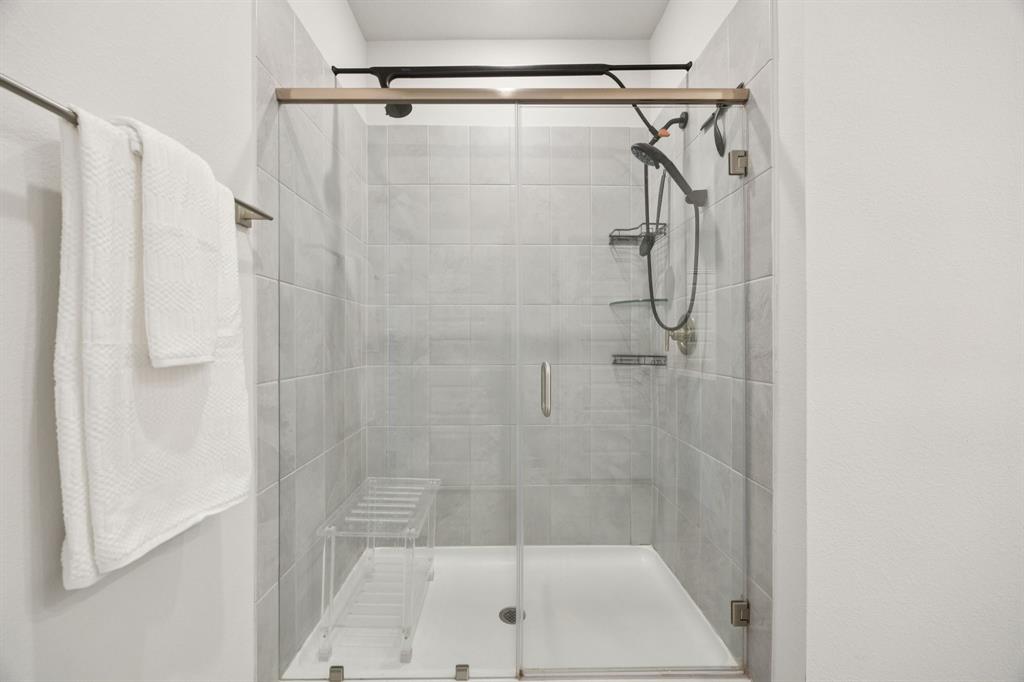 722 Cari Lane Forney, TX 75126 - Photo 19 of 40 a bathroom with a shower