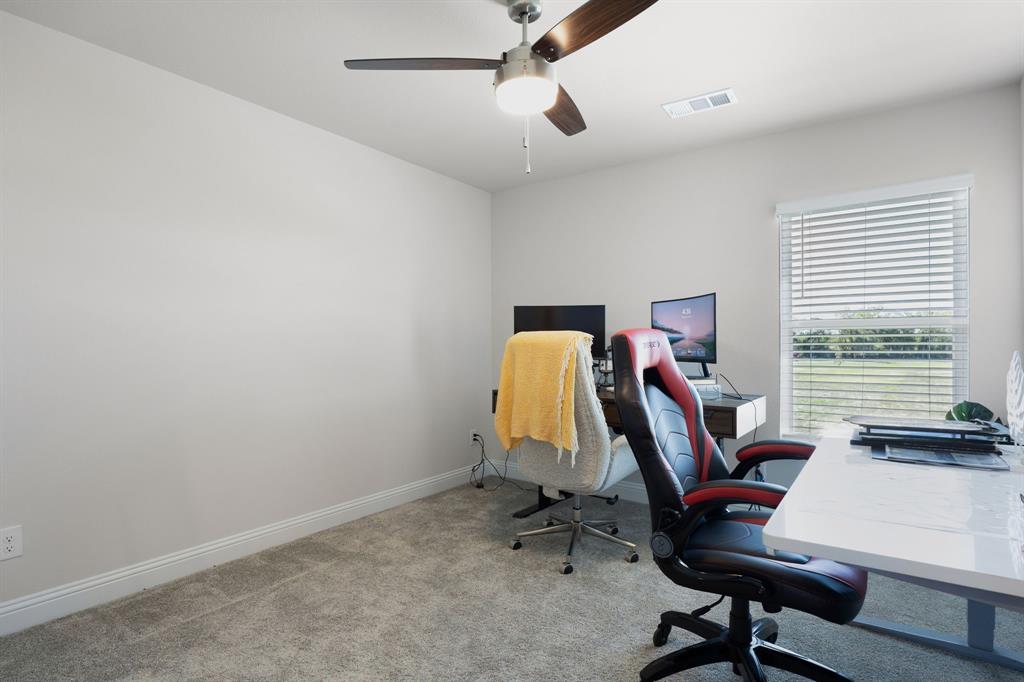 722 Cari Lane Forney, TX 75126 - Photo 20 of 40 a view of a workspace with furniture and a window