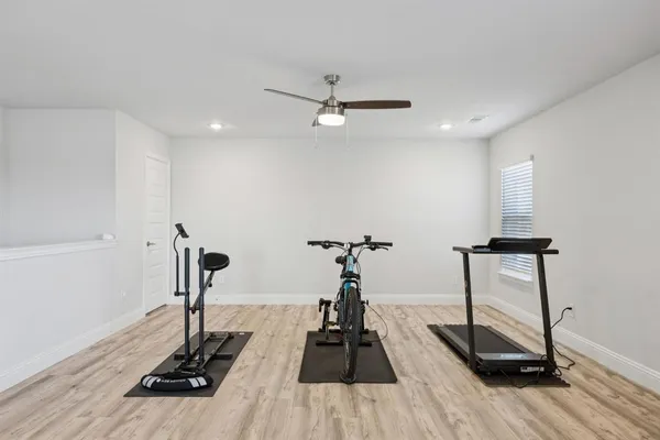 a view of a room with gym equipment