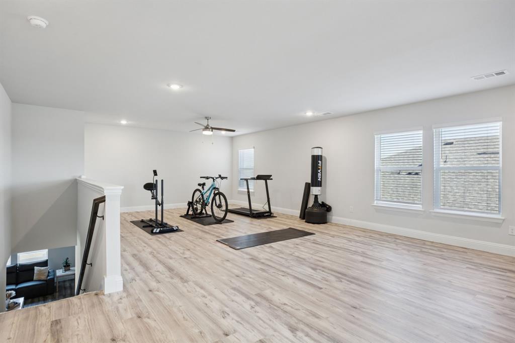 722 Cari Lane Forney, TX 75126 - Photo 28 of 40 a view of a room with gym equipment