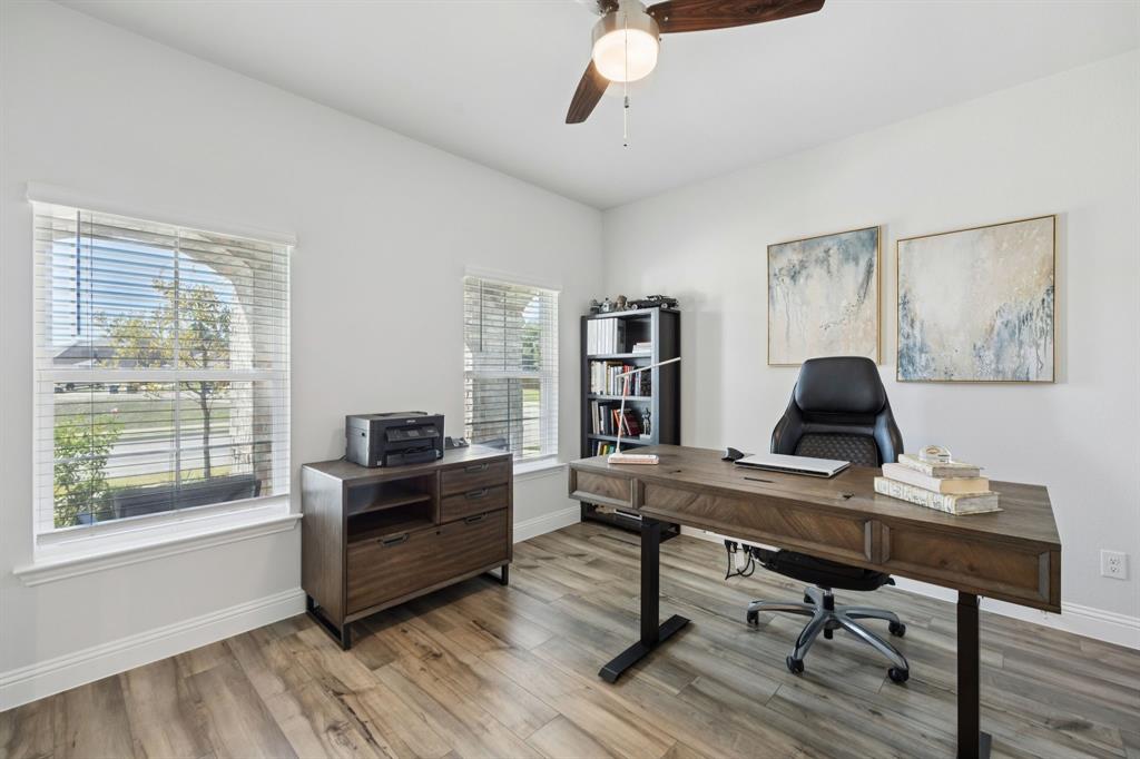 722 Cari Lane Forney, TX 75126 - Photo 5 of 40 a view of a workspace with furniture and a window
