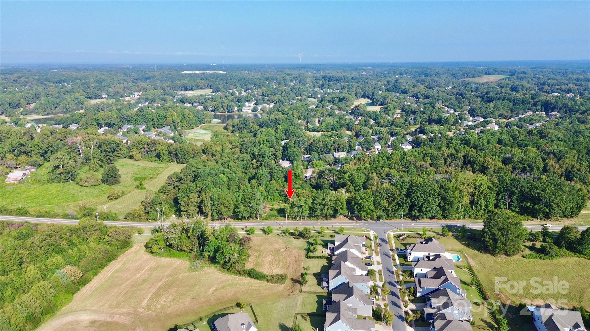 13315 Ramah Church Road Huntersville, NC 28078 - Photo 9 of 9 an aerial view of a city with lots of residential buildings
