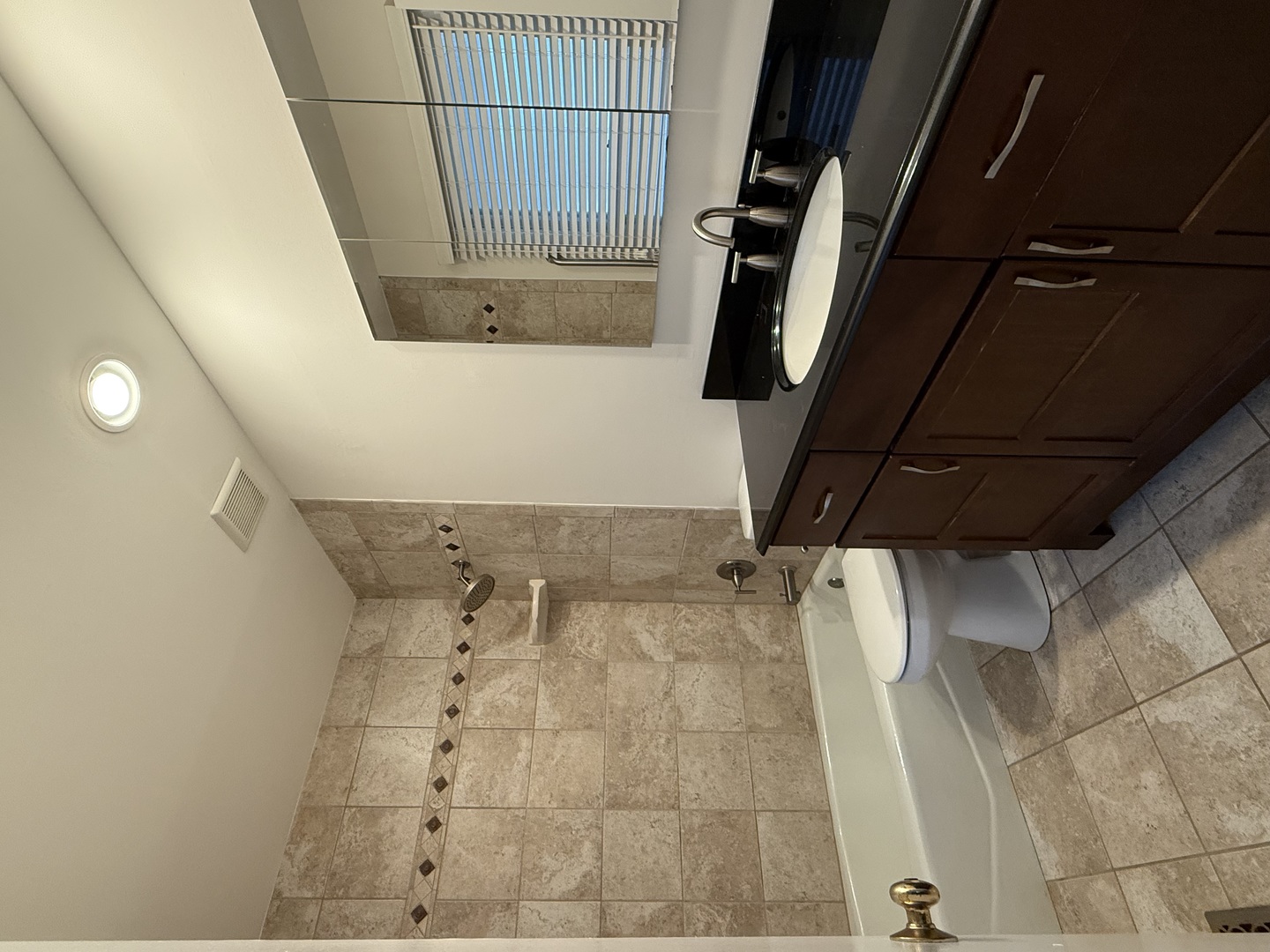 504 Old Hunt Road Fox River Grove, IL 60021 - Photo 8 of 12 a bathroom with a sink and a mirror