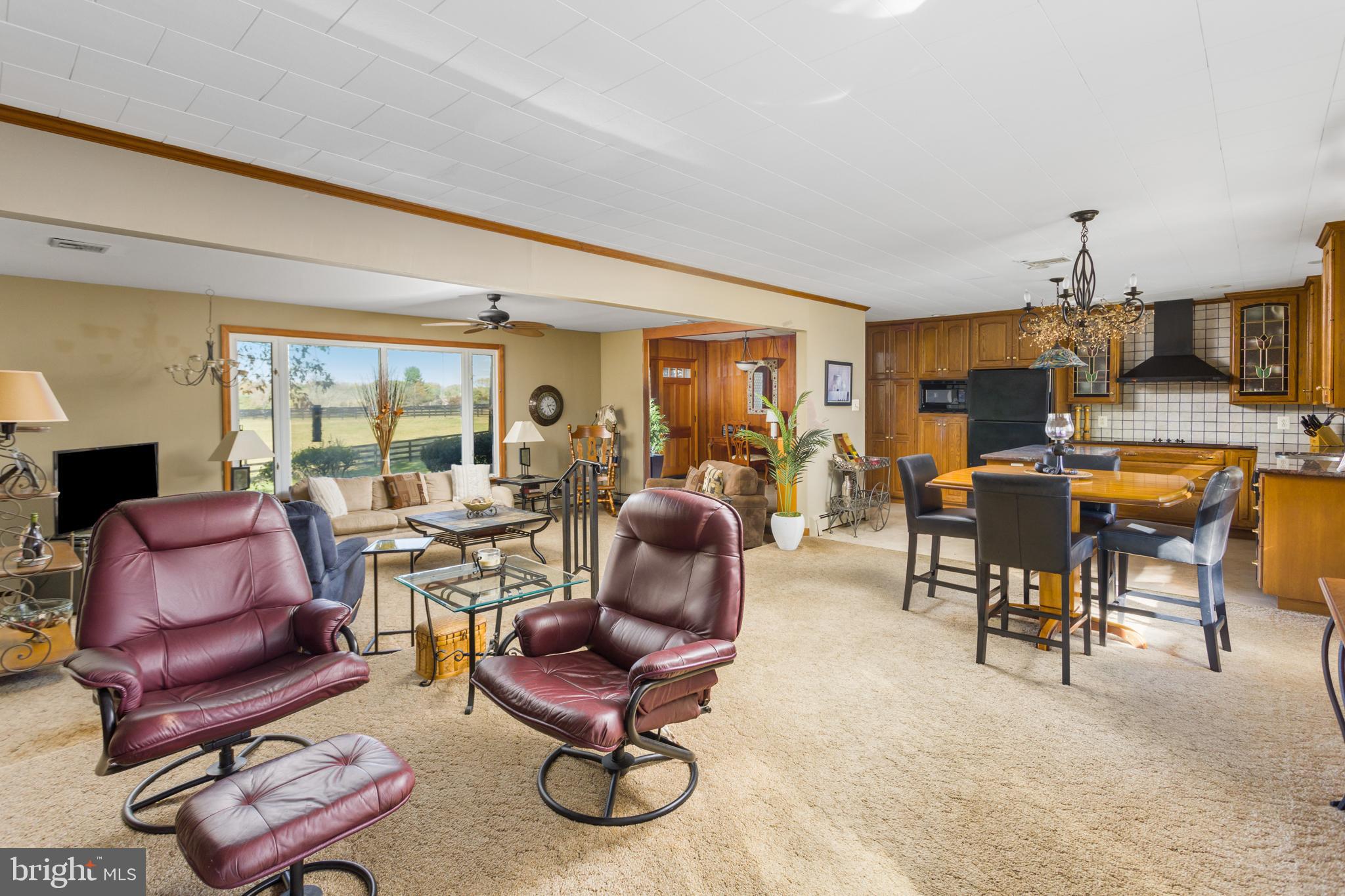 193 Burlington Path Road Cream Ridge, NJ 08514 - Photo 14 of 51 a living room with furniture and a large window