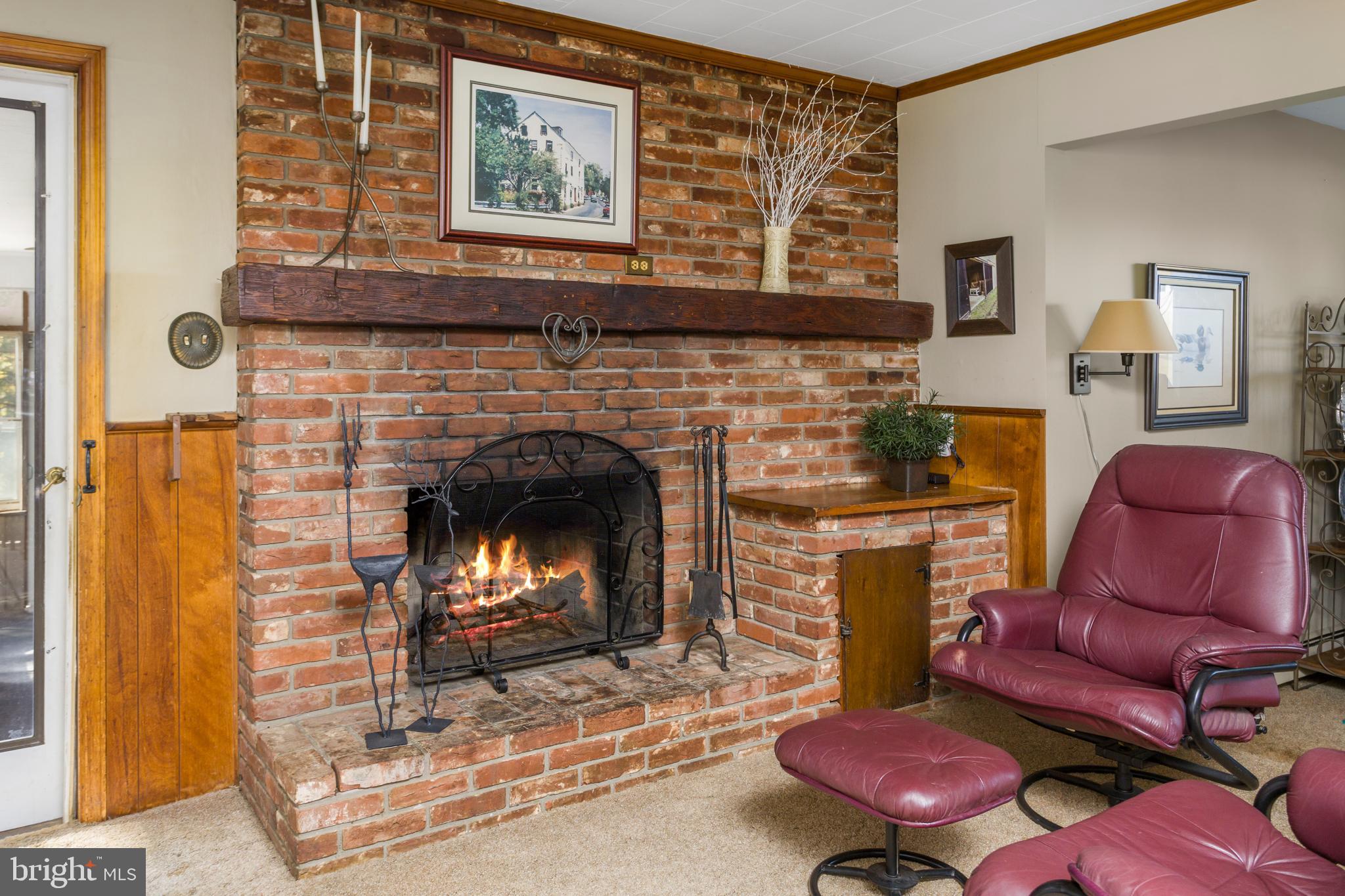 193 Burlington Path Road Cream Ridge, NJ 08514 - Photo 20 of 51 a living room with furniture and a fireplace