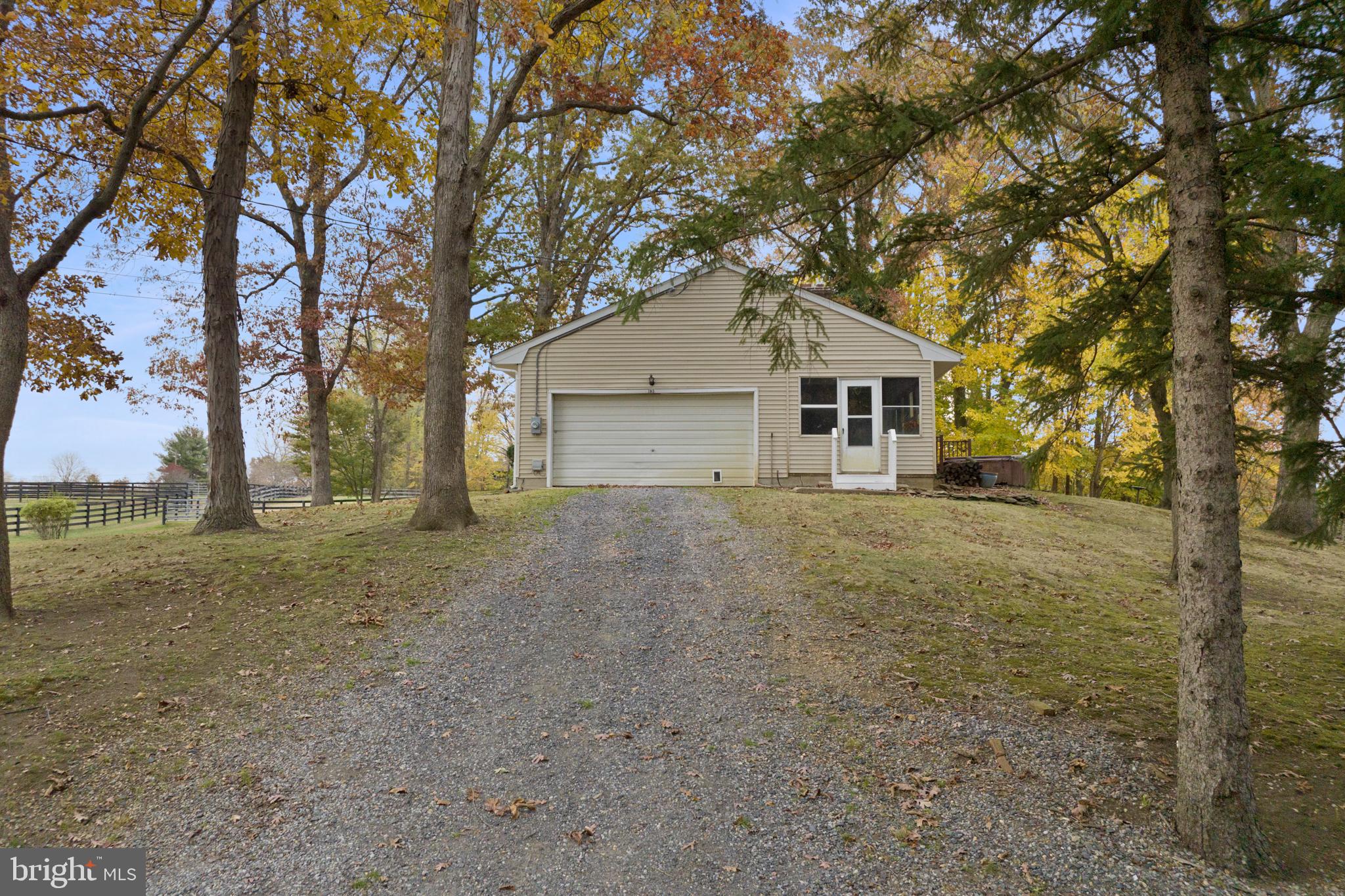 193 Burlington Path Road Cream Ridge, NJ 08514 - Photo 34 of 51 a front view of a house with a garden