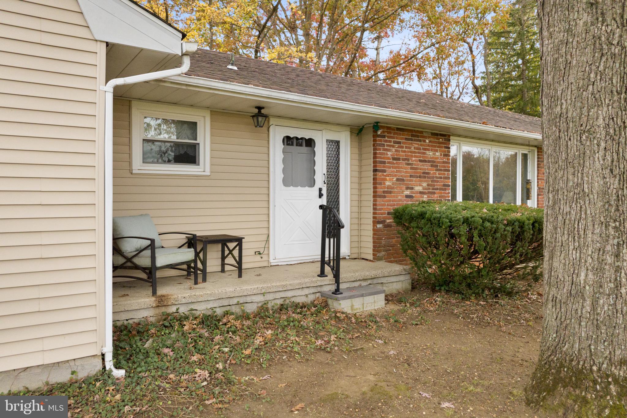 193 Burlington Path Road Cream Ridge, NJ 08514 - Photo 8 of 51 a view of a house with backyard and sitting area
