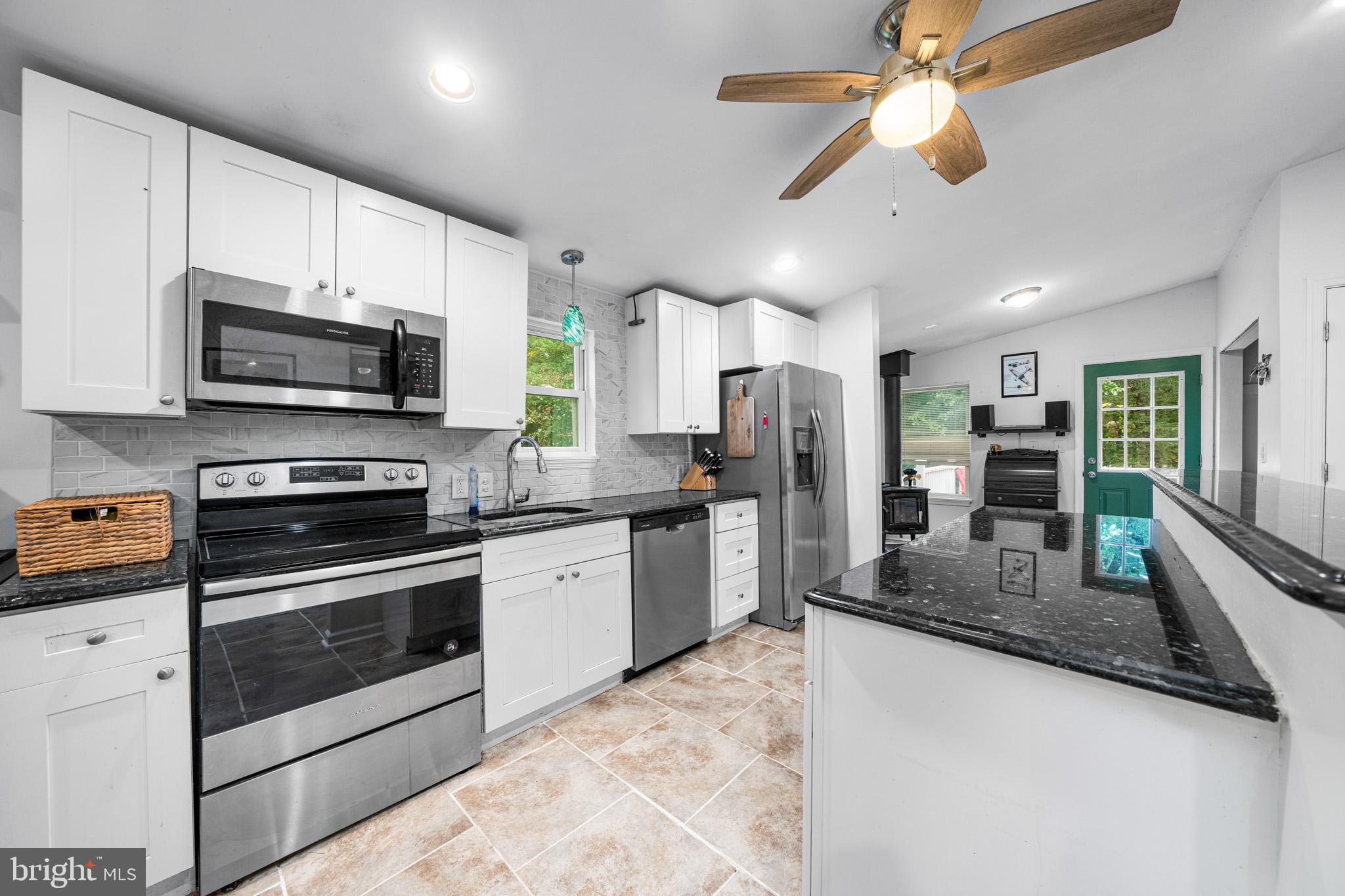 1172 Dexter Corner Road Townsend, DE 19734 - Photo 16 of 31 Tiled floor and stainles steel appliances