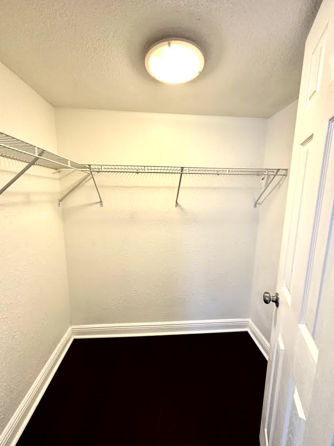 9235 Southwest 8th Street, Unit 108 Boca Raton, FL 33428 - Photo 12 of 23 Walk-in Closet