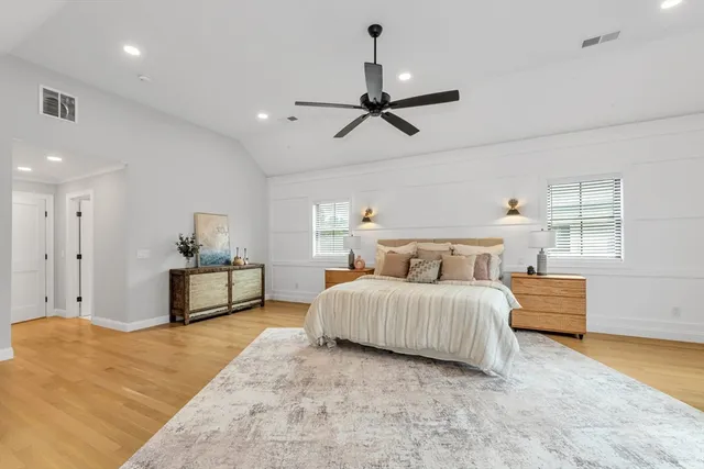 a bedroom with bed and window