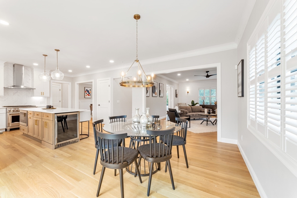 2 Brownson Terrace Boston, MA 02130 - Photo 6 of 30 a view of a dining room and livingroom with furniture wooden floor a chandelier