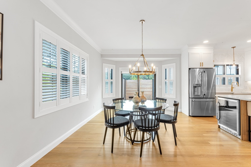 2 Brownson Terrace Boston, MA 02130 - Photo 10 of 30 a view of a dining room with furniture window and wooden floor