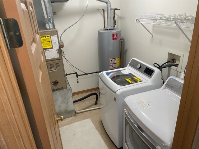 2439 Oneida Lane Naperville, IL 60563 - Photo 12 of 15 a utility room with dryer and washer