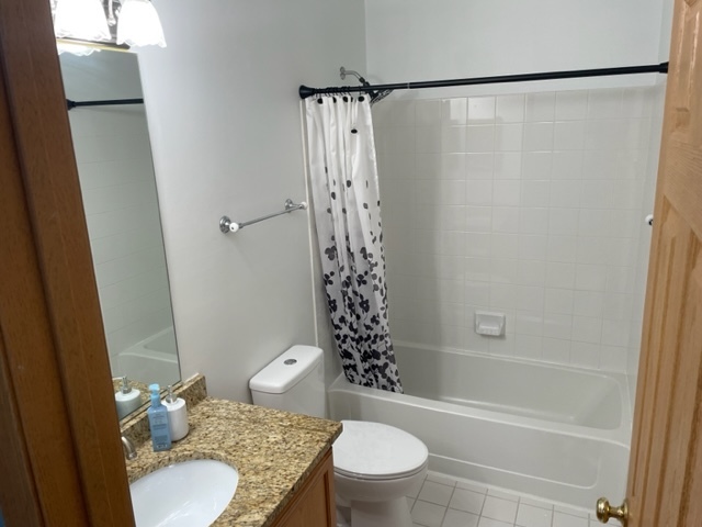 2439 Oneida Lane Naperville, IL 60563 - Photo 13 of 15 a bathroom with a granite countertop sink toilet and shower