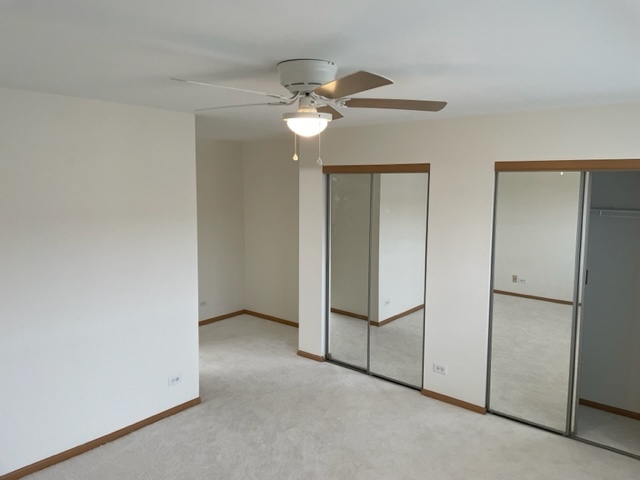2439 Oneida Lane Naperville, IL 60563 - Photo 10 of 15 a view of empty room with fan