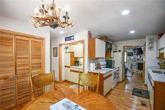 a living room with fireplace furniture and a flat screen tv