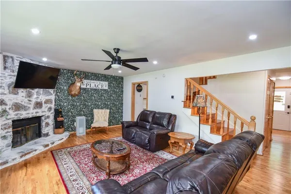 a bathroom with a shower and a sink