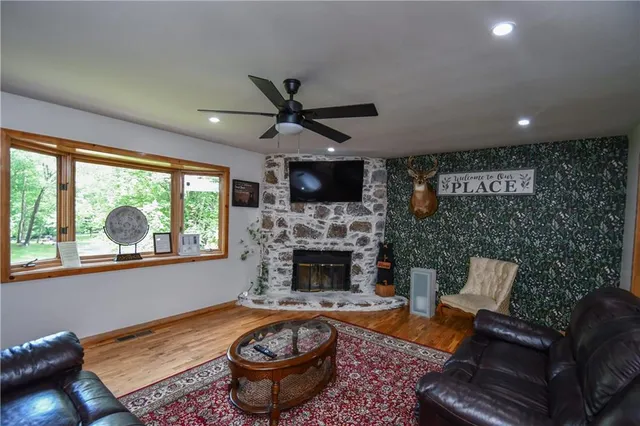 a living room with furniture and a window