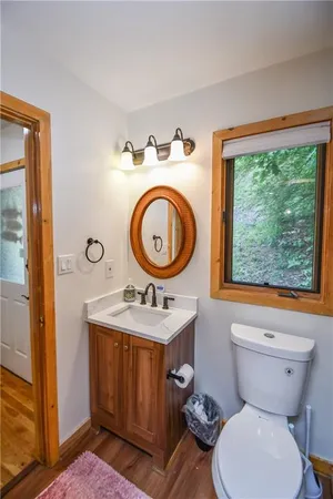 a view of entryway with wooden floor