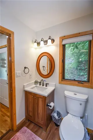 a view of entryway with wooden floor