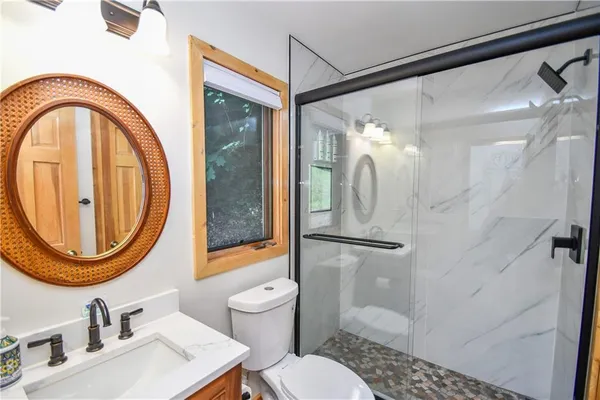 a view of a hallway with seating area