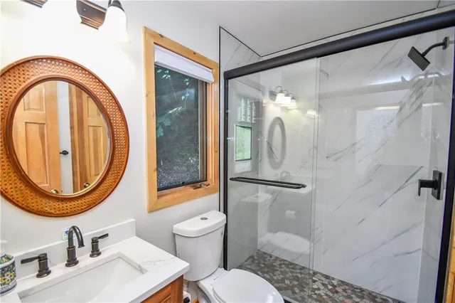 a view of a hallway with seating area