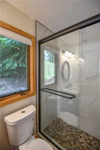 a en suite bathroom with a sink and a mirror