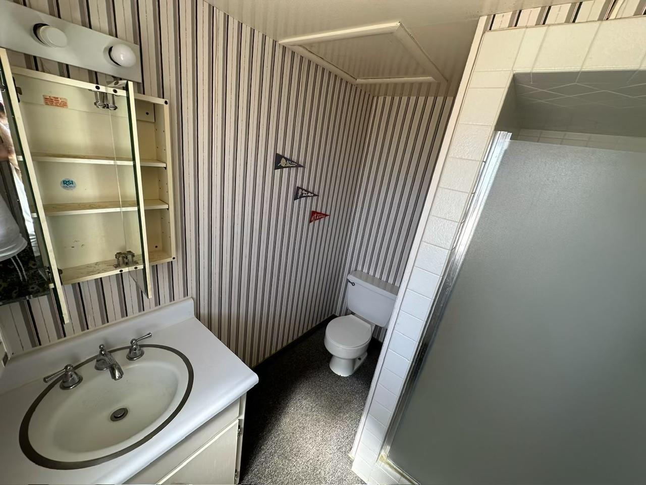 985 Grove Avenue Gustine, CA 95322 - Photo 12 of 14 a bathroom with a sink and toilet