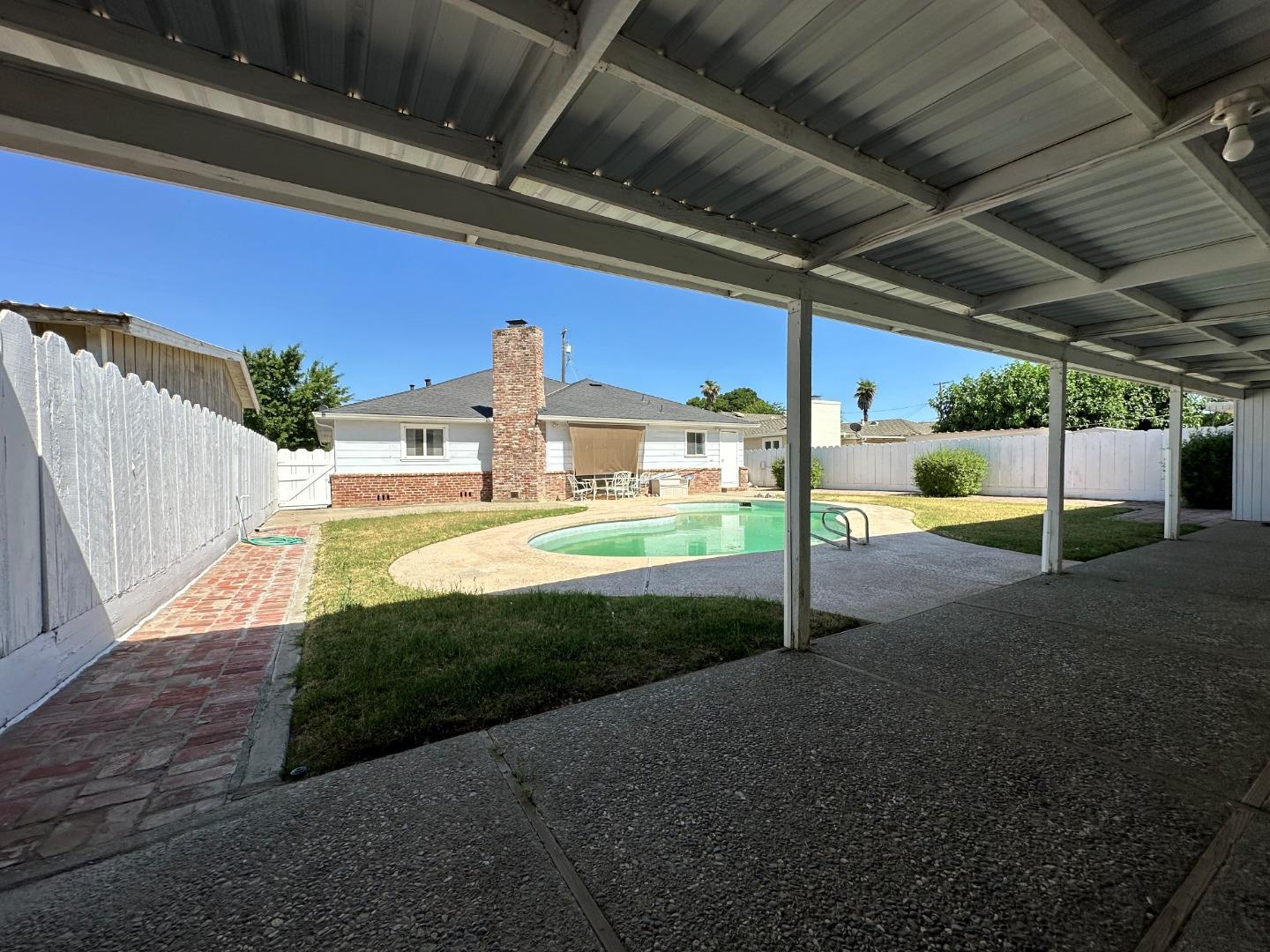 985 Grove Avenue Gustine, CA 95322 - Photo 13 of 14 a view of a porch