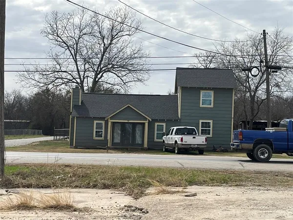 a car parked in front of a house