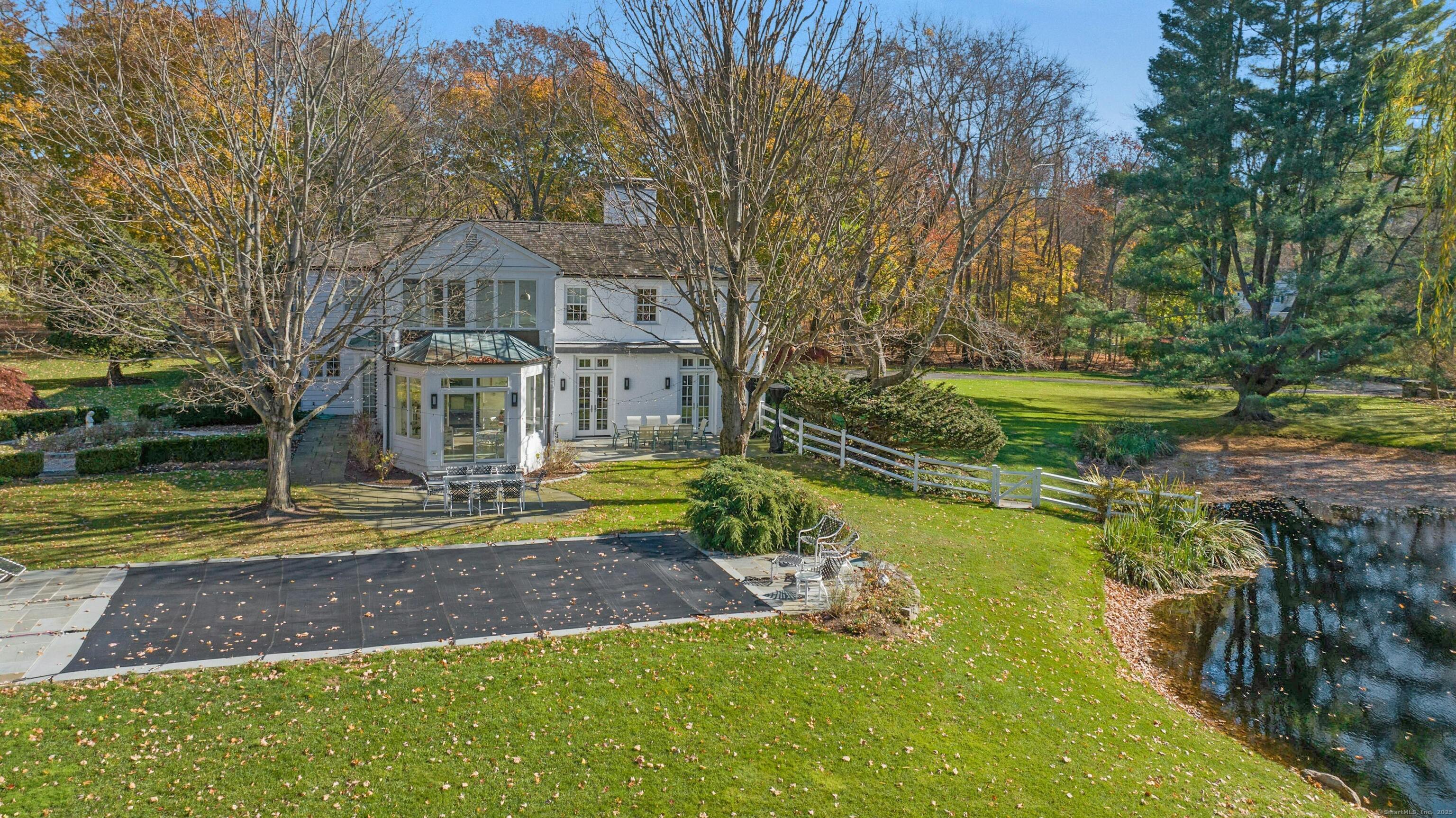 75 Hanson Road Darien, CT 06820 - Photo 27 of 30 a front view of a house with a yard