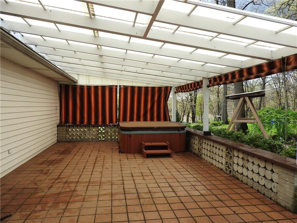 110 Rays Road Fenelton, PA 16034 - Photo 18 of 25 16x30 tile floor patio with hot tub. Great space for entertaining family, friends & guest.