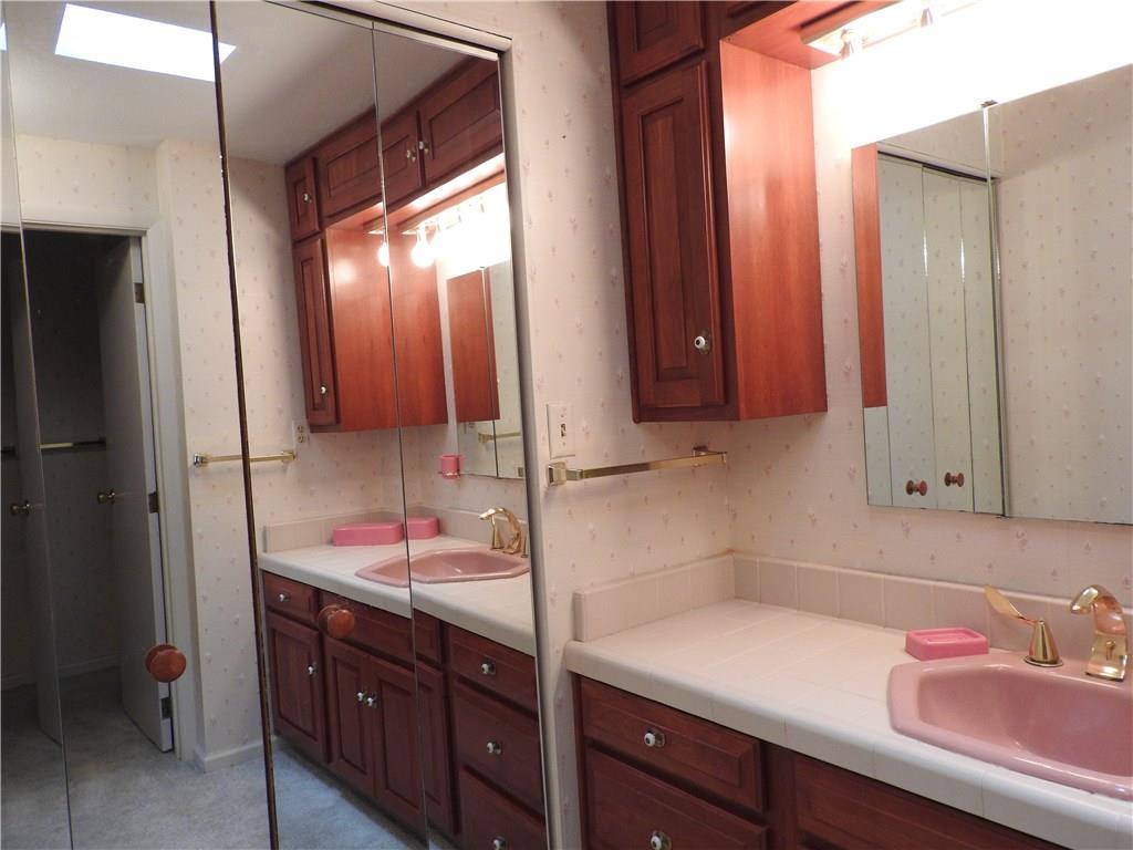 110 Rays Road Fenelton, PA 16034 - Photo 20 of 25 Master bathroom with cherry cabinetry.