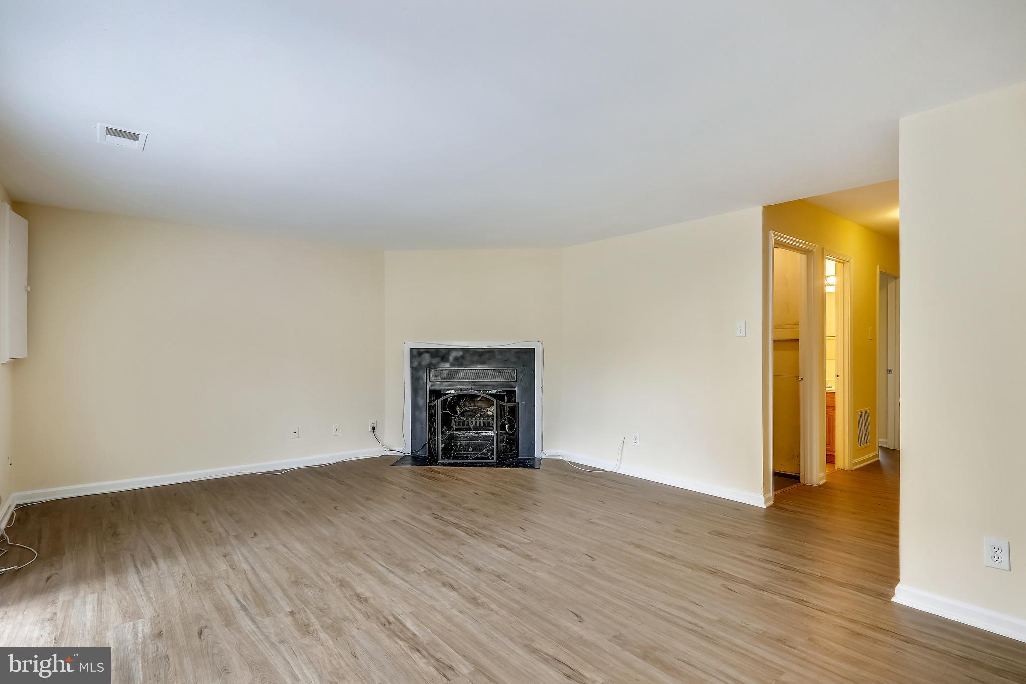 10600 Georgia Avenue Silver Spring, MD 20902 - Photo 30 of 44 Lower level rec-room (fireplace decorative only)