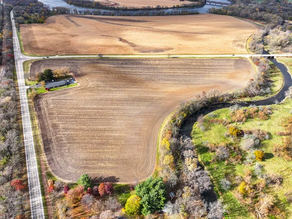 a view of a swimming pool with an outdoor space and seating area