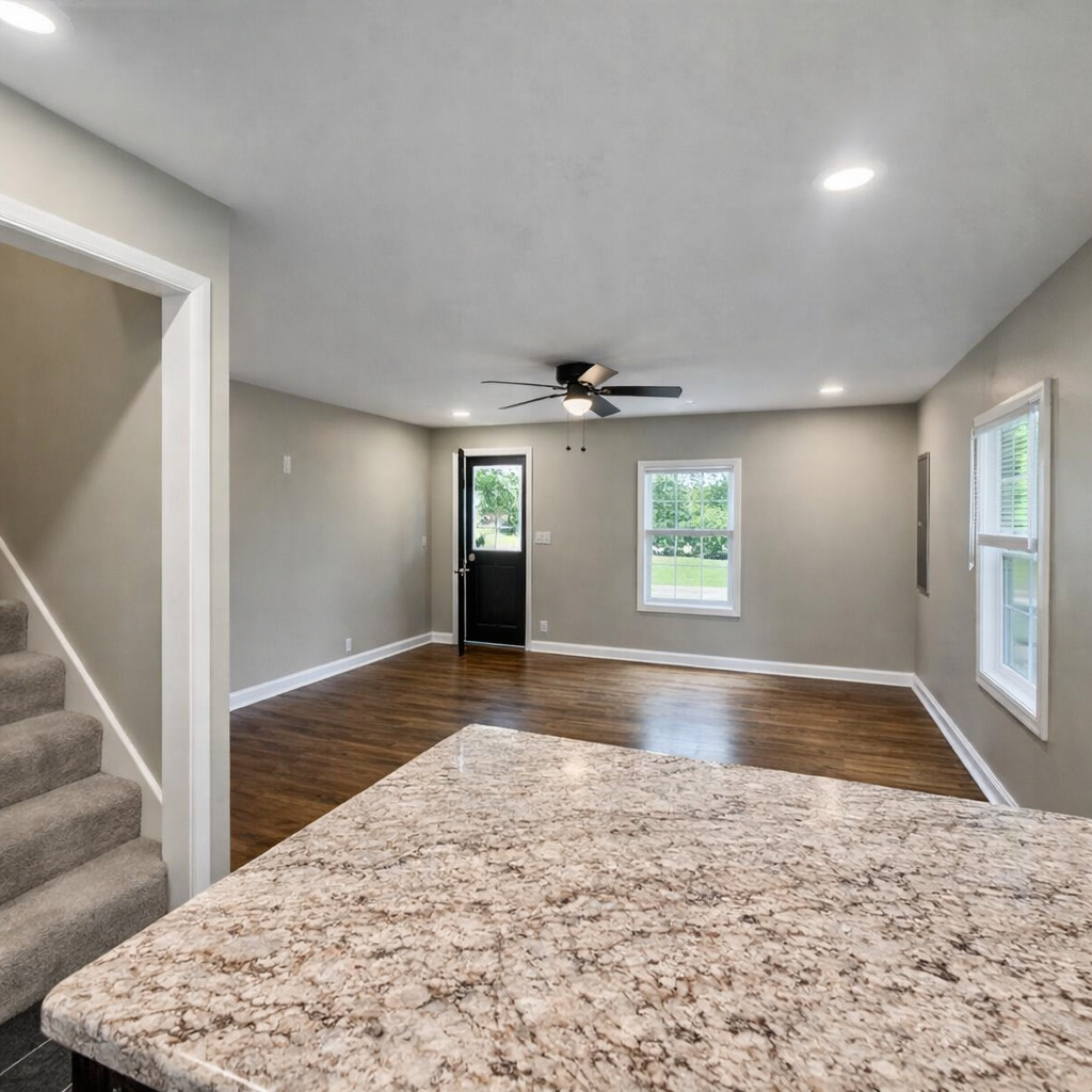 314 West 12th Street Metropolis, IL 62960 - Photo 18 of 29 a view of empty room with wooden floor and window