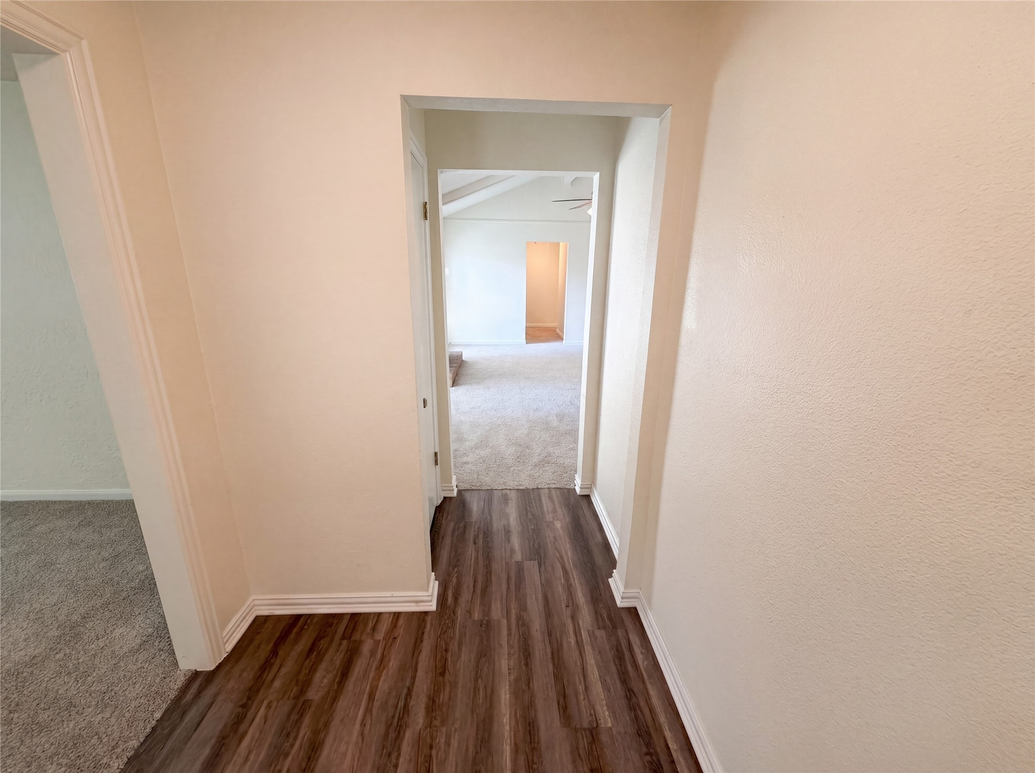 342 Queenstown Road Houston, TX 77015 - Photo 15 of 22 a view of a hallway with wooden floor