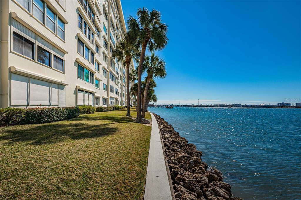 4750 Cove Circle, Unit 303 St. Petersburg, FL 33708 - Photo 39 of 64 a view of a large body of water with a house