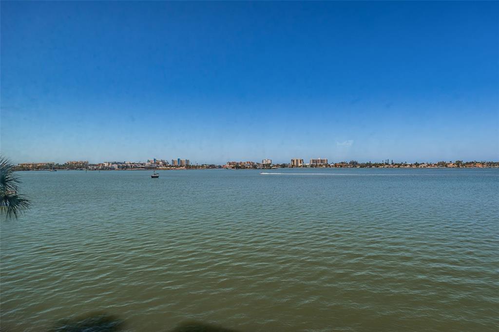 4750 Cove Circle, Unit 303 St. Petersburg, FL 33708 - Photo 4 of 64 a view of a ocean with a lake