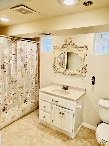 a pathway of a house with wooden floor