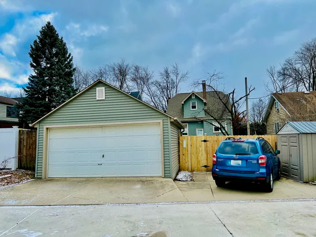 a view of a chairs and table in the patio