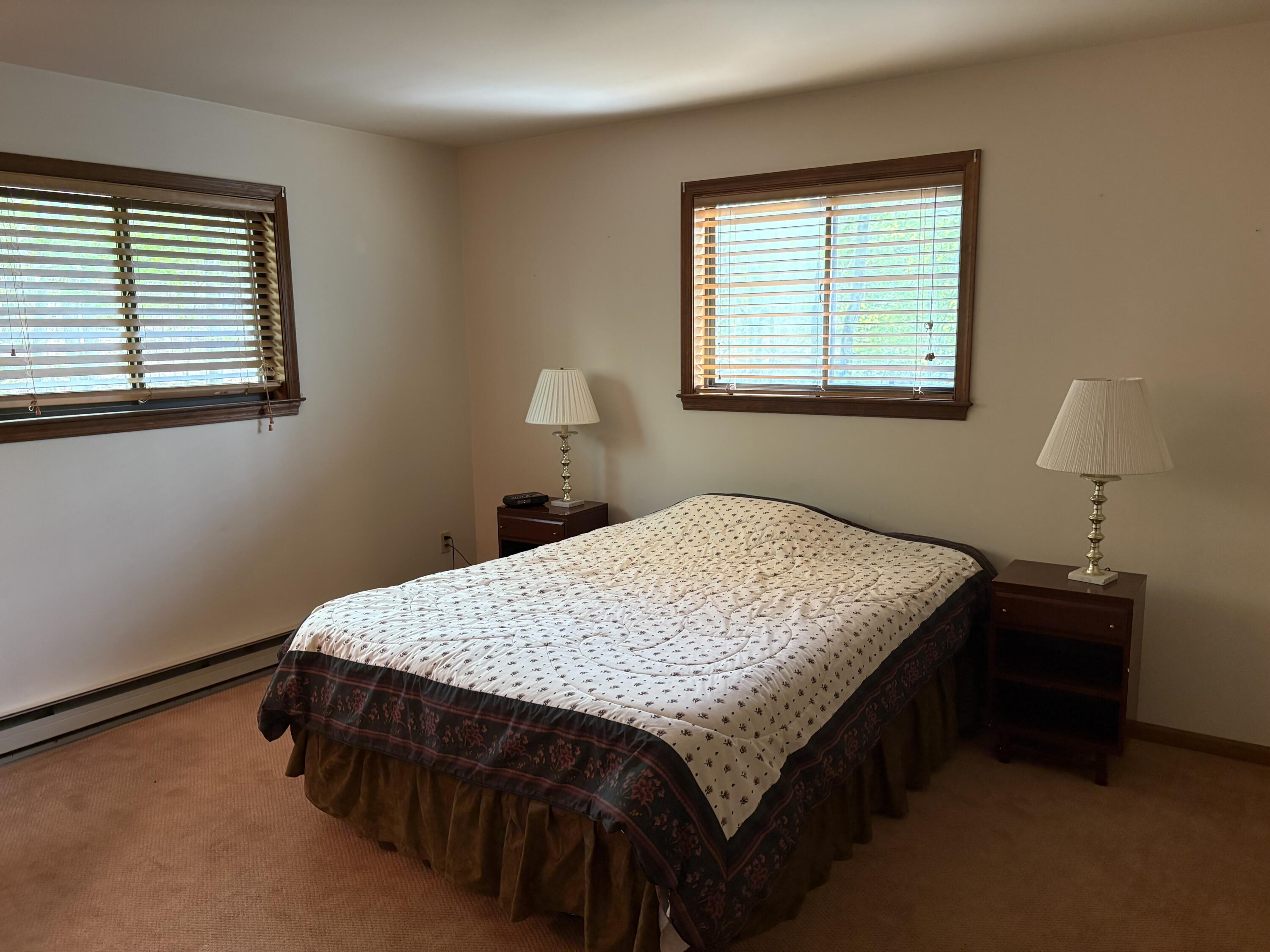 368 Ridge Road Pocono Lake, PA 18347 - Photo 22 of 42 a bedroom with a bed and a window