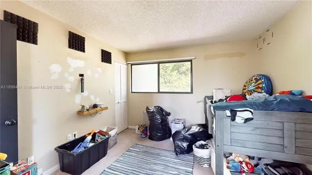 a room with furniture and rug