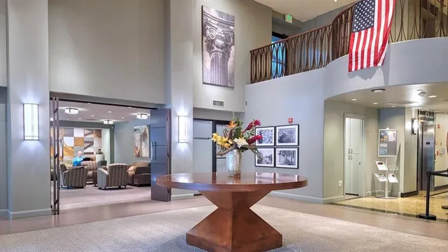 a view of a living room and entry way