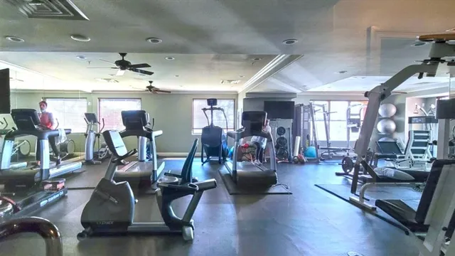 a view of a room with gym equipment