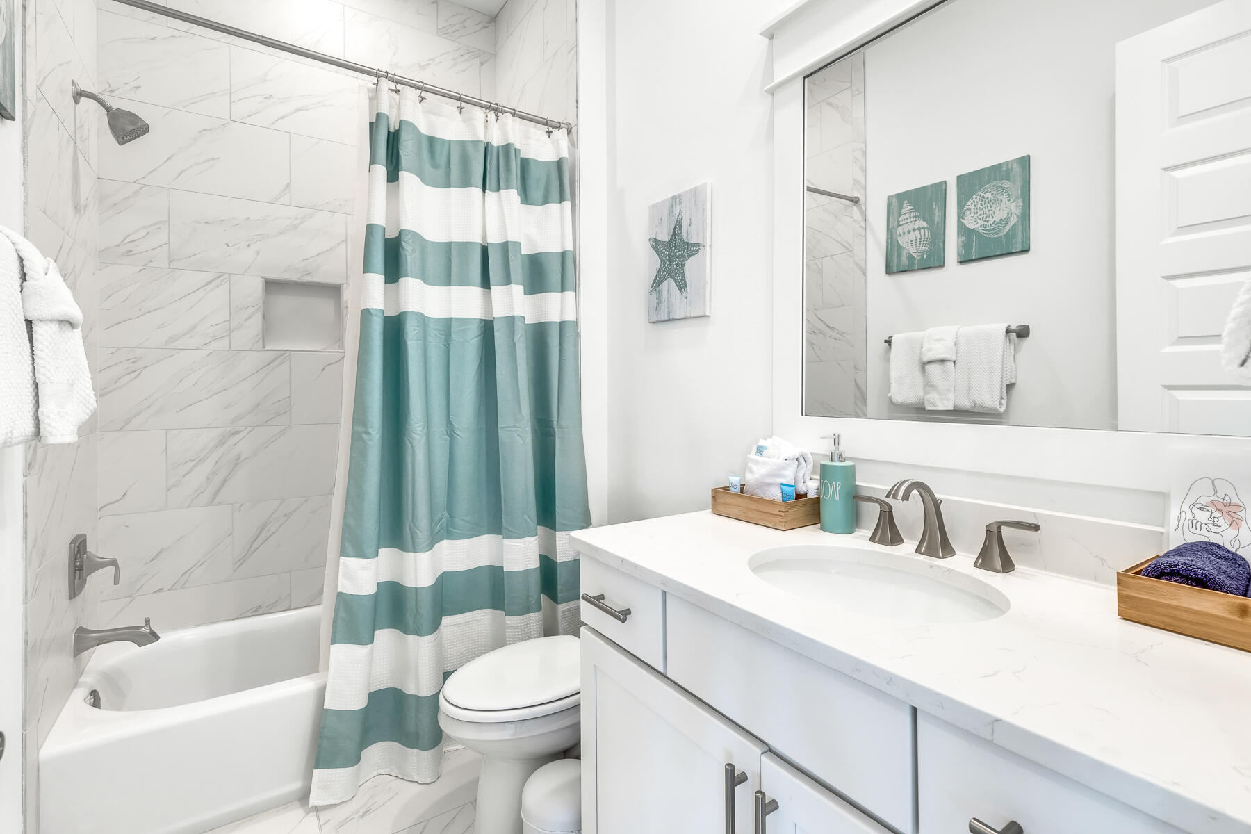 110 Wharf Ln Inlet Beach, Unit C Inlet Beach, FL 32461 - Photo 26 of 53 a bathroom with a sink toilet and shower